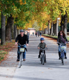 family bike ride on the walls of lucca, italy