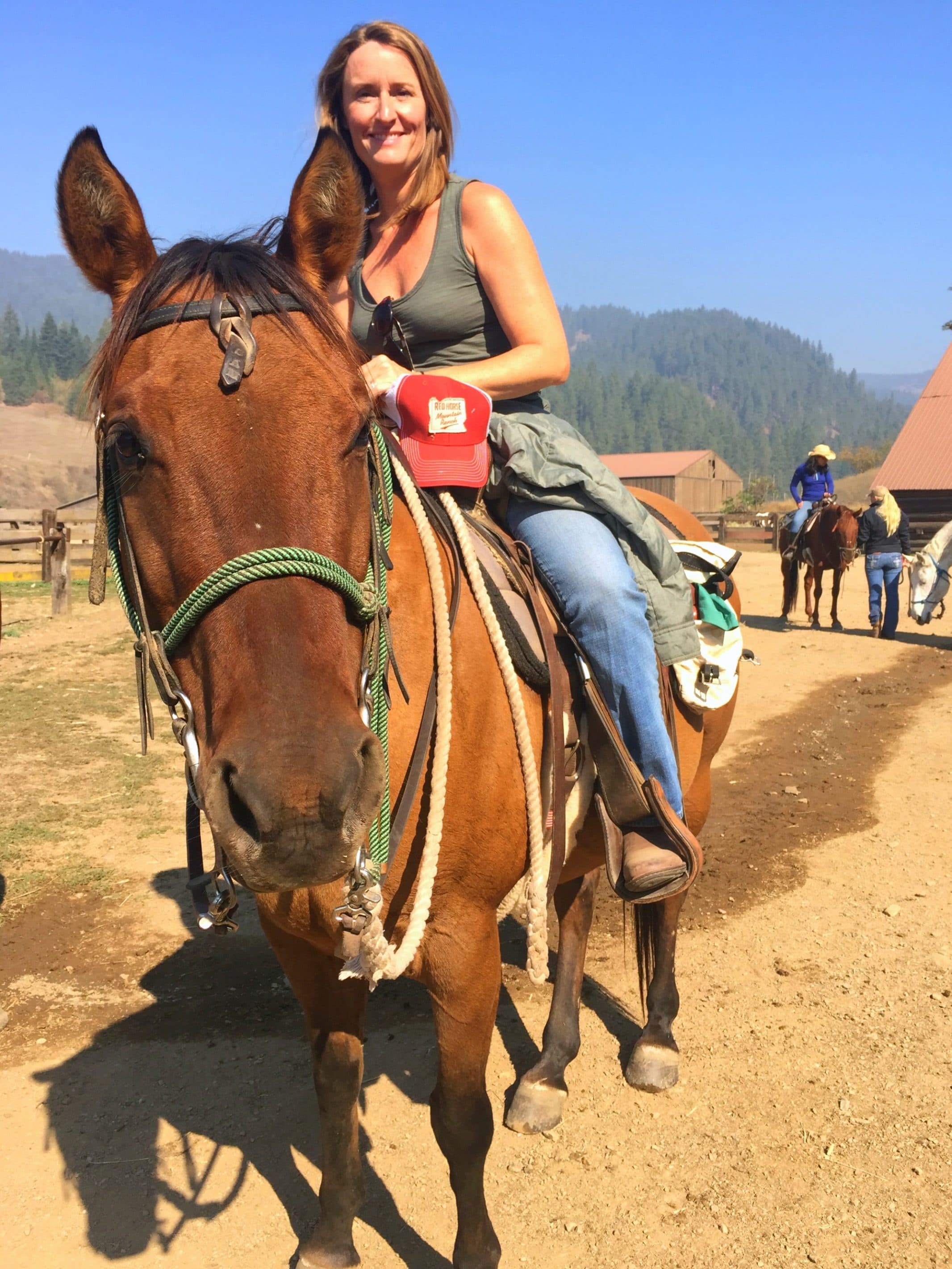 Guests enjoy daily horseback riding lessons and trail rides at Red Horse Mountain Ranch.