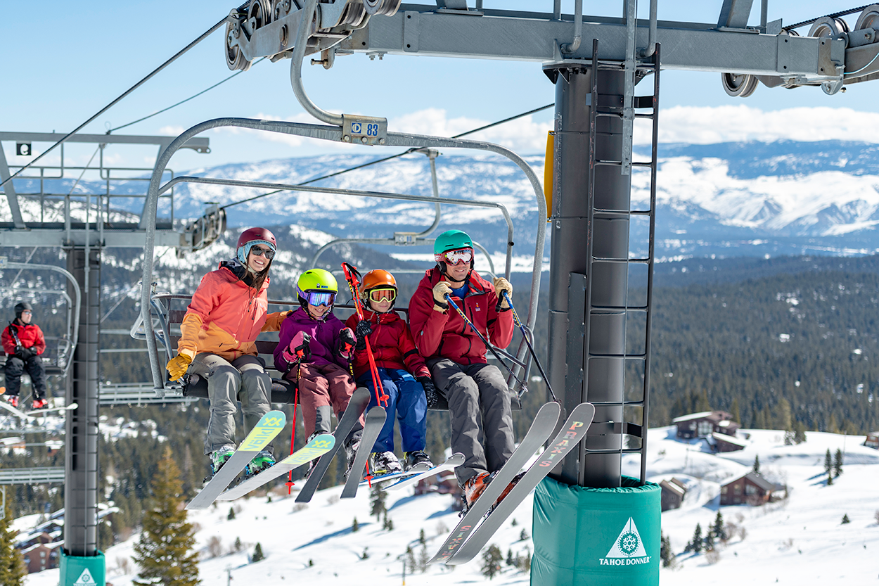 Family riding the ski lift at Tahoe Donner in Lake Tahoe California