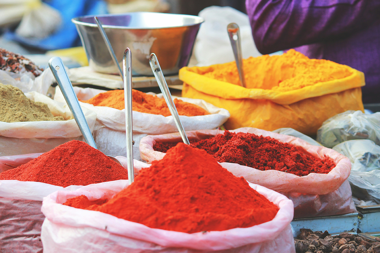 Spices at the market. Photo by Akhil Chandran on Unsplash