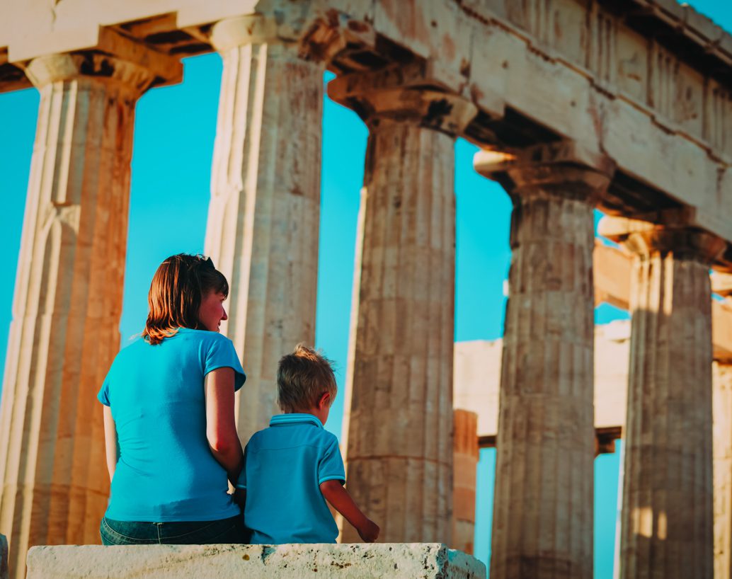 Mother and son traveling in ancient Greece