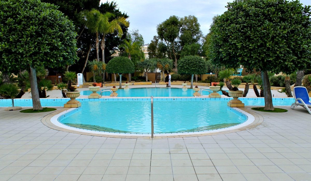 Corinthia Palace's outdoor pool is a great place to relax in the summer.