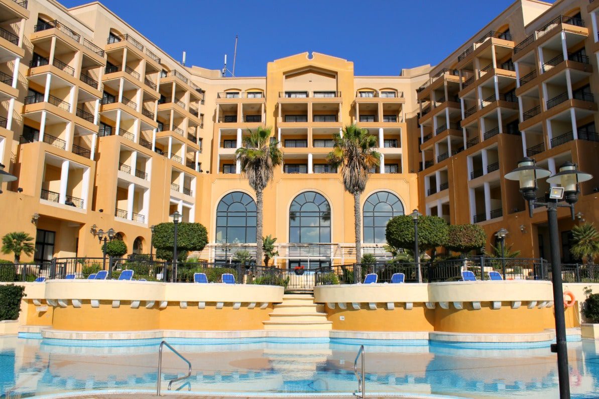 Corinthia St. George's Bay dramatic exterior catches lots of Maltese sunshine throughout the day.