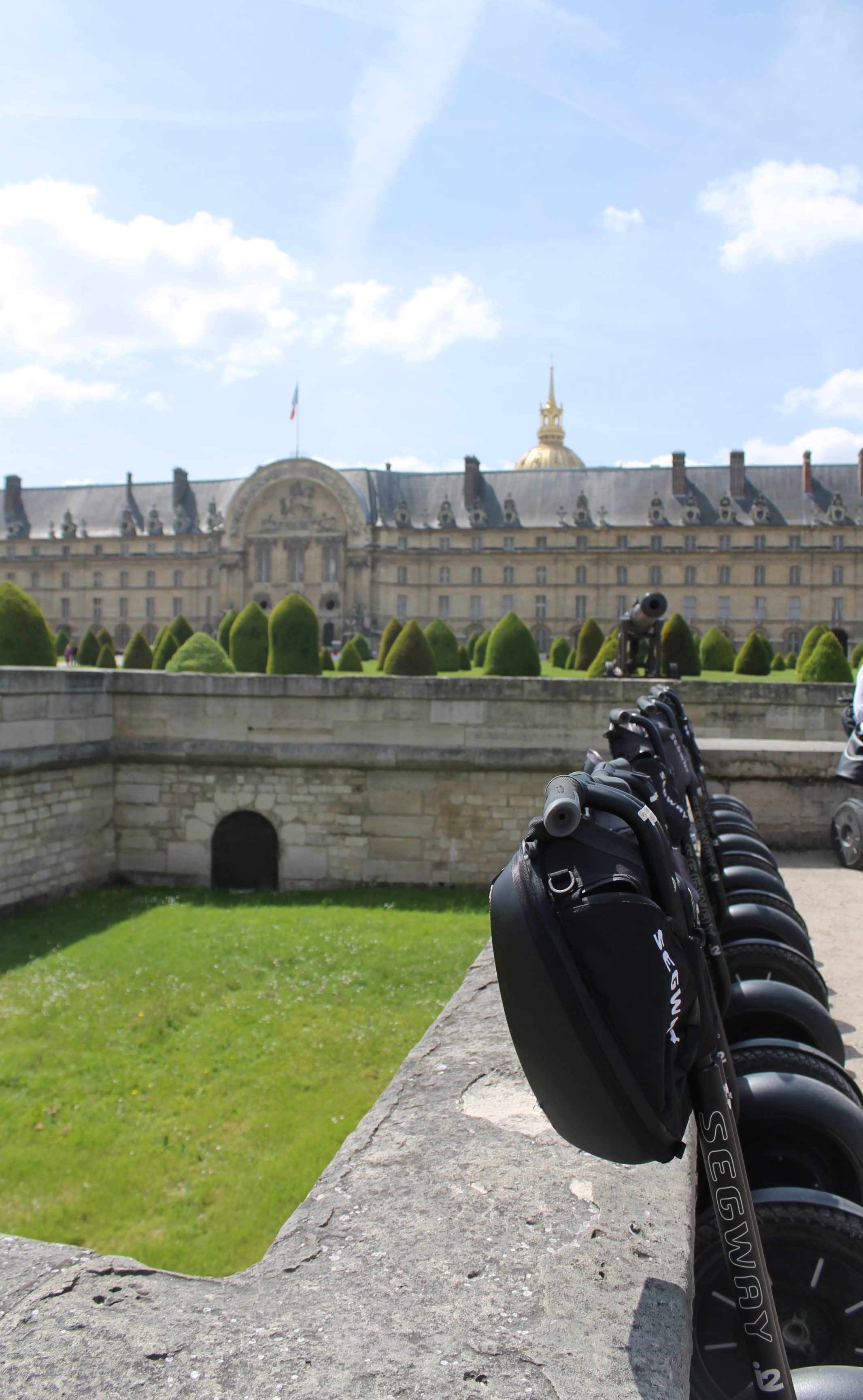 Segways lined up during a stop at the Hotel des Invalides on a Fat Tire Segway tour.
