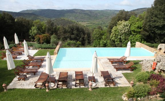 One of the community pools at Montestigliano is for adults only, while the second welcomes families with children. Typical Tuscan countryside views abound throughout the property.