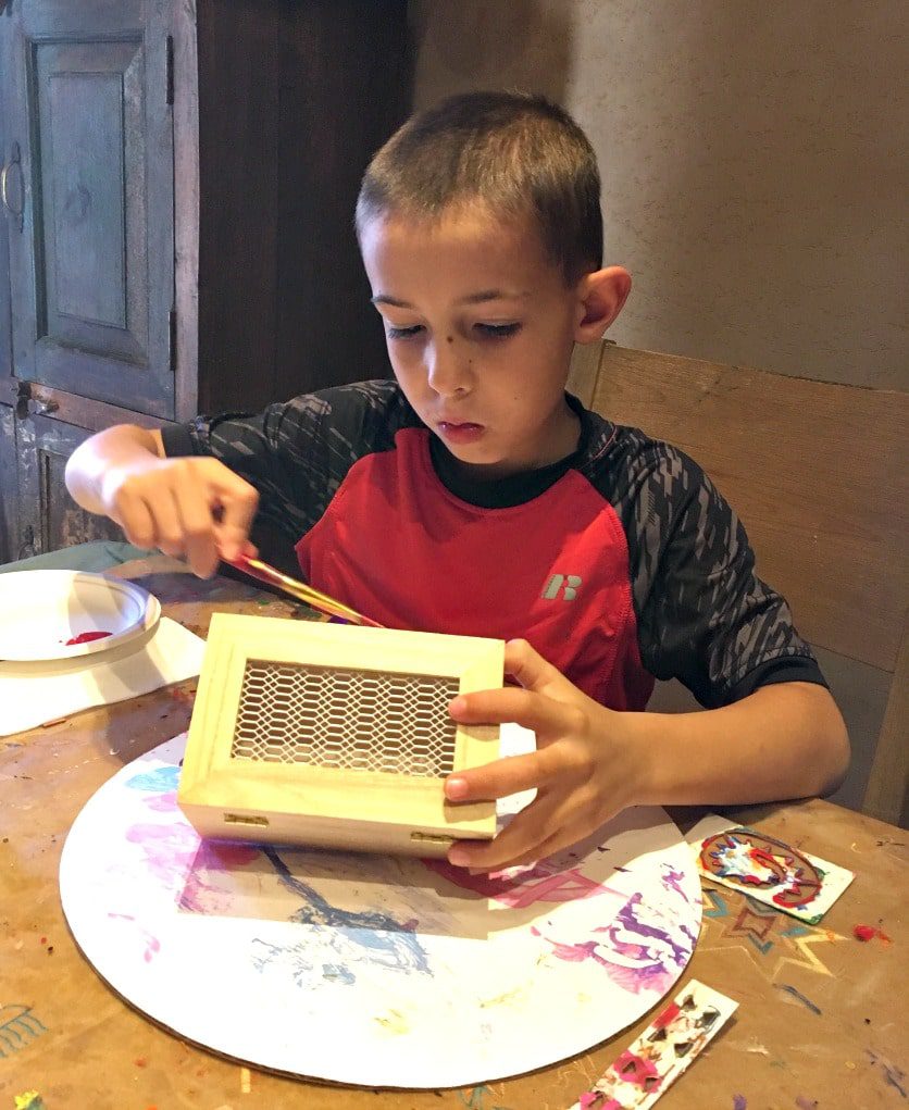 Painting Native American petroglyphs onto treasure boxes are just one of many activities for families.