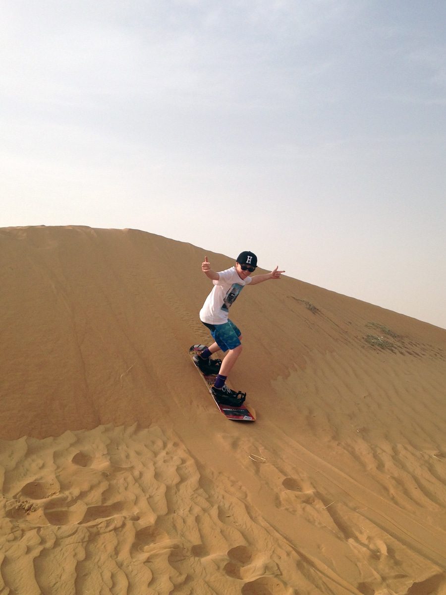 Best Activities in Dubai with Kids, sand boarding
