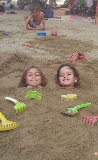 Kids on Barcelona Beach Spain
