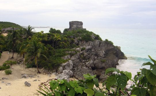 Tulum's Mayan ruins perch atop a dramatic oceanfront cliff.