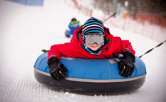 The tubing hill is the perfect off-the-slopes adrenaline rush. Photo: Snowbasin, a Sun Valley Resort.