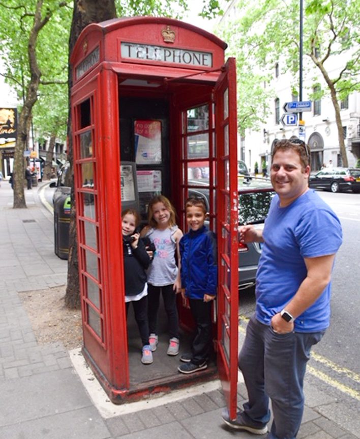 Children in telephone booth