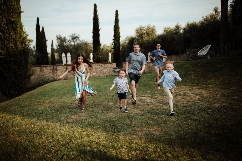 kids running around tuscany