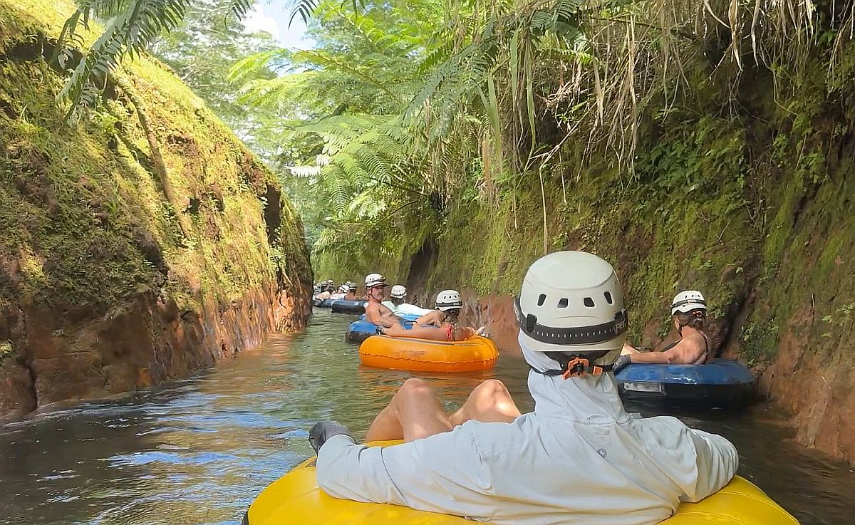 Tubing in sugar irrigation canals on Kauai